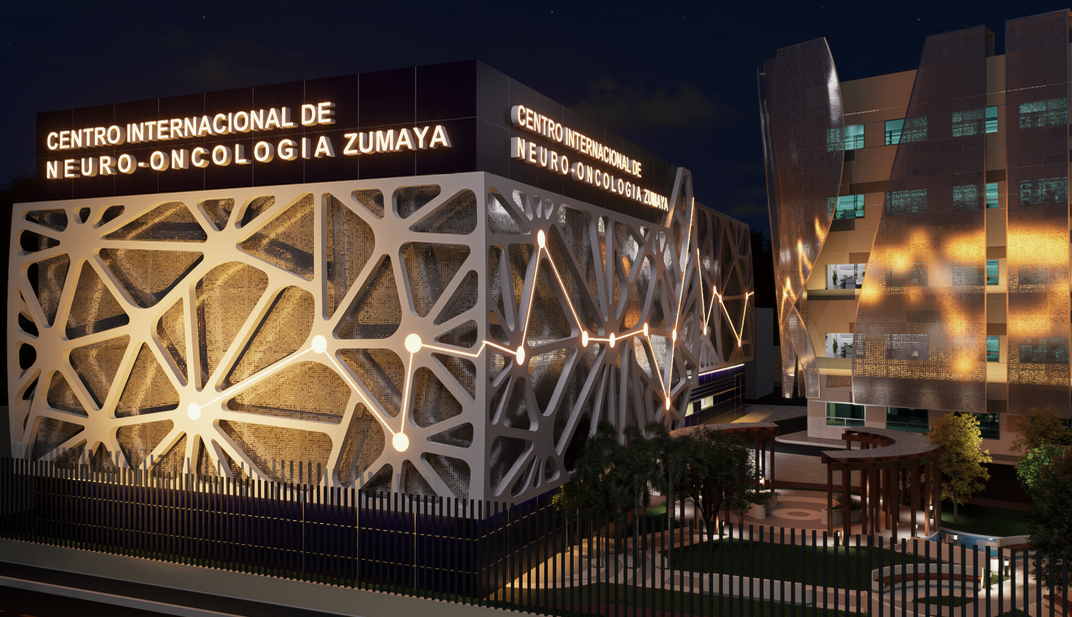 Fachada del Centro Internacional de Neuro-Oncología Zumaya iluminada de noche